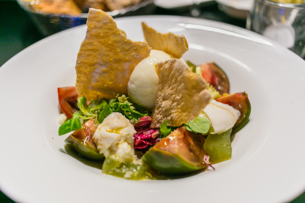Tomatoes with burrata, green basil jelly & lemon sorbet on top – Tapas