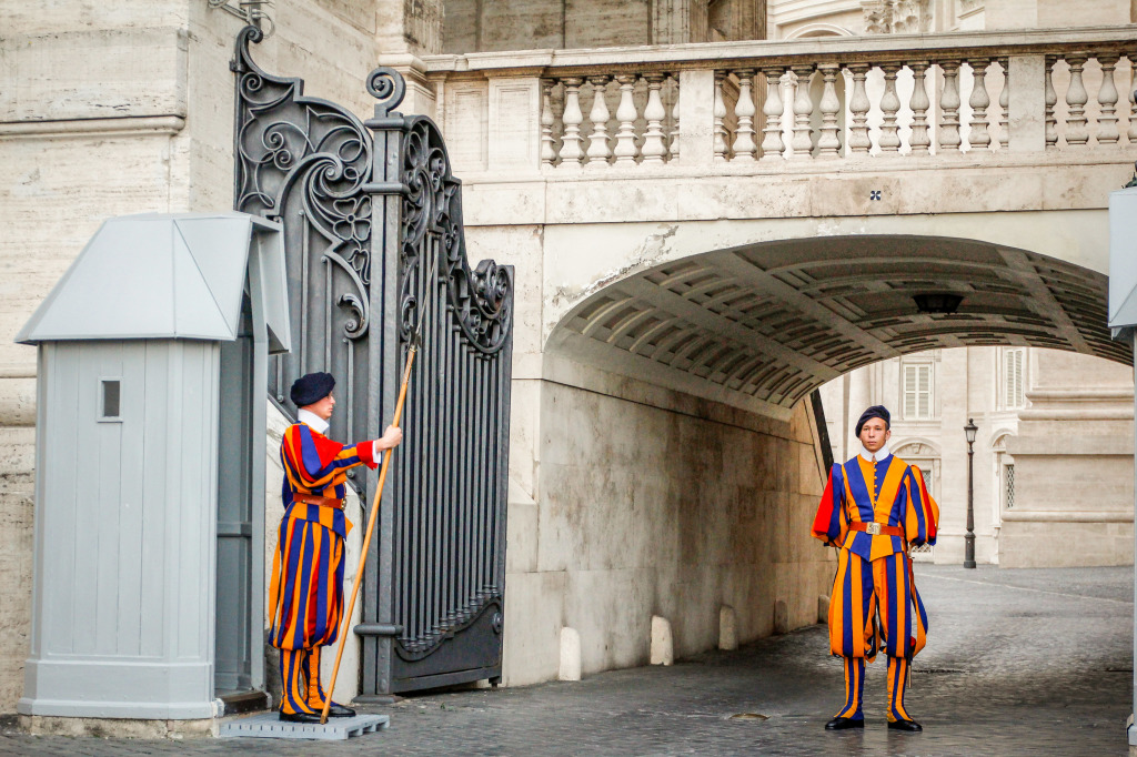 Vatican Swiss Guards.  Their uniforms protecting the Pope has been same since 1500's.  
